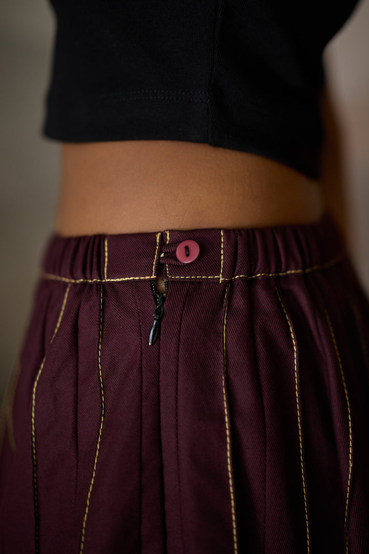 PINTUCK SOHO SKIRT-MERLOT
